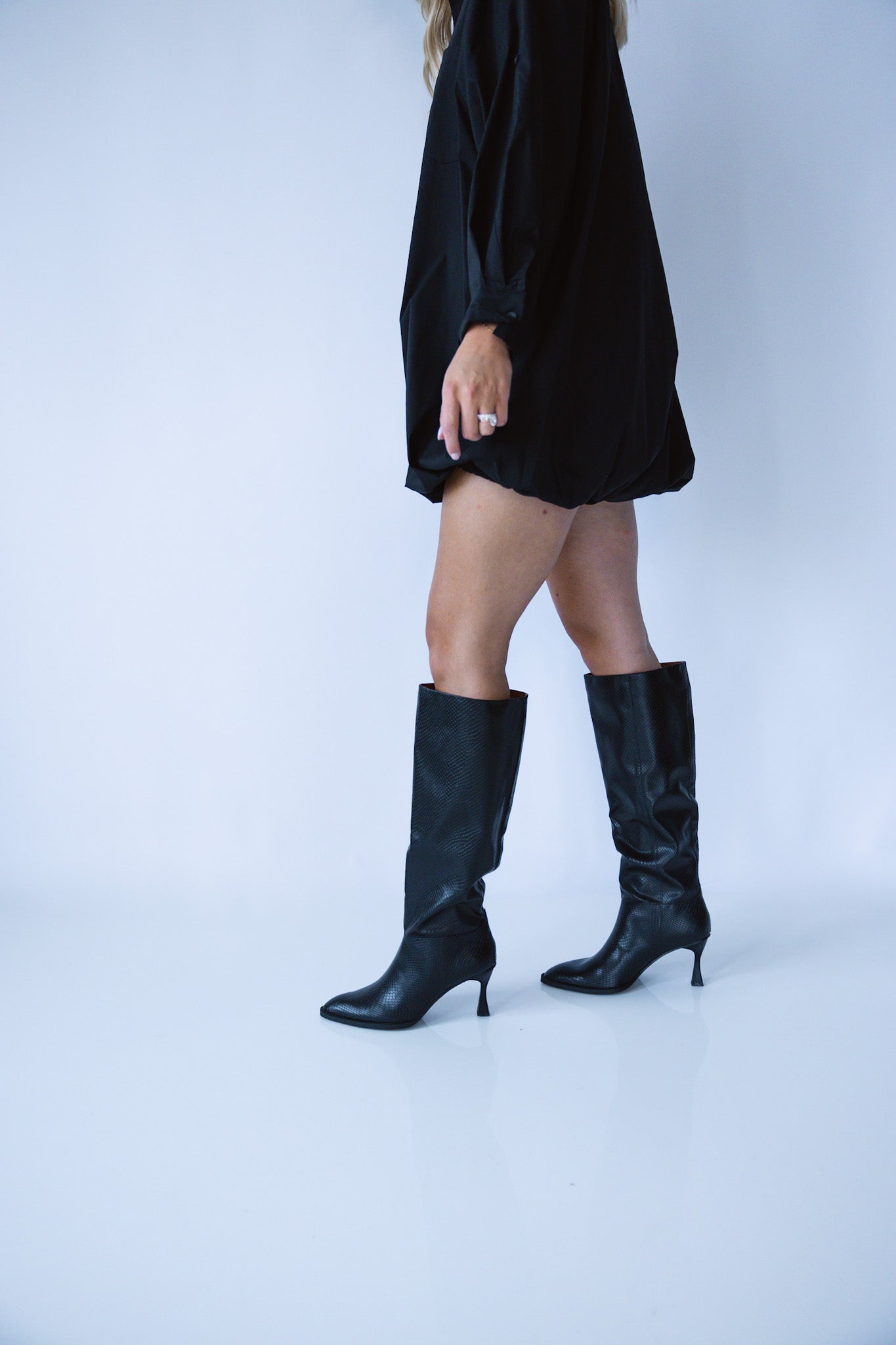 The Serpentine High-Knee Stiletto Boots